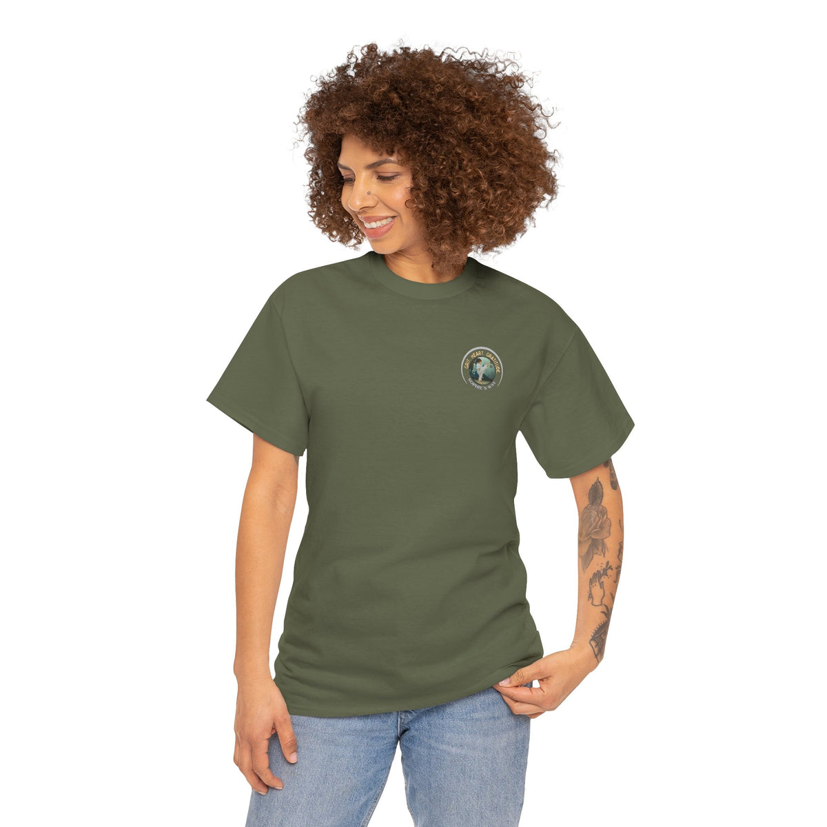 Military green colored t-shirt with a small round logo of a taekwondo girl doing a side kick and the words Grit. Heart. Gratitude. Sophie's Way.