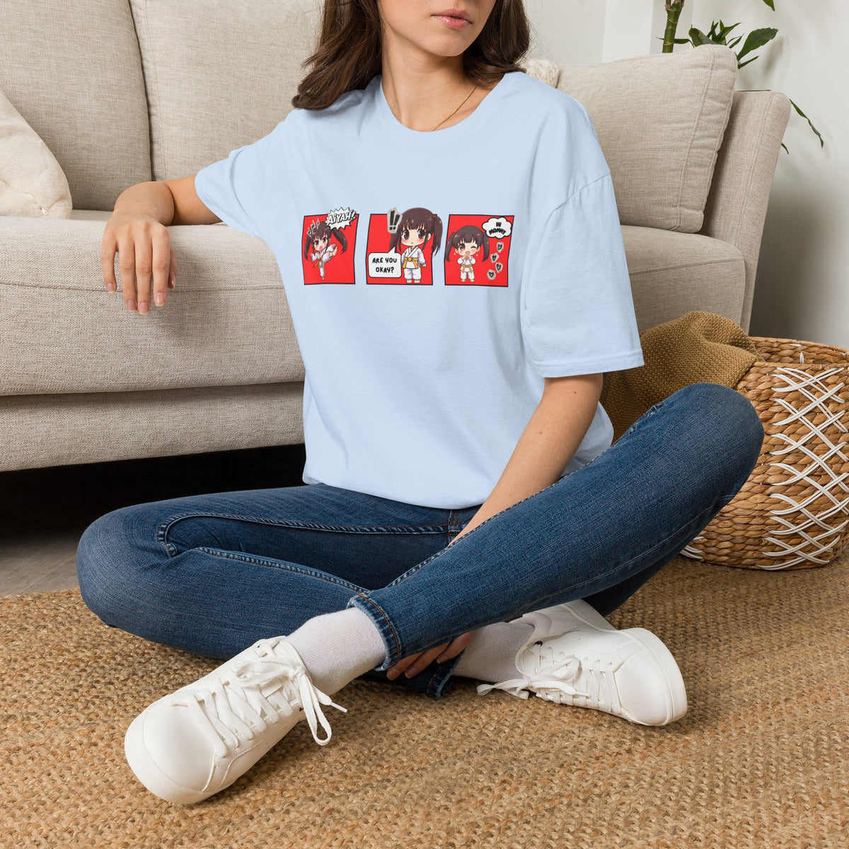 Are You Okay? unisex softstyle t-shirt in light blue with chibi taekwondo girl three-panel comic strip graphic — "Aiyah!", "Are You Okay?", "Hi Mommy"