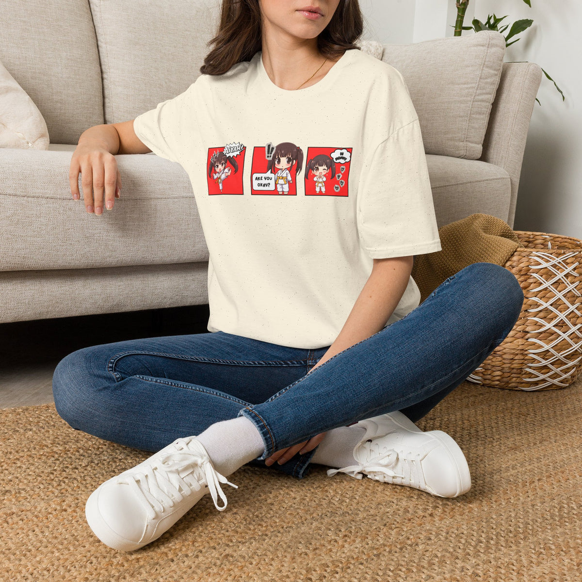 Are You Okay? unisex softstyle t-shirt in natural/cream with chibi taekwondo girl three-panel comic strip graphic — "Aiyah!", "Are You Okay?", "Hi Mommy"
