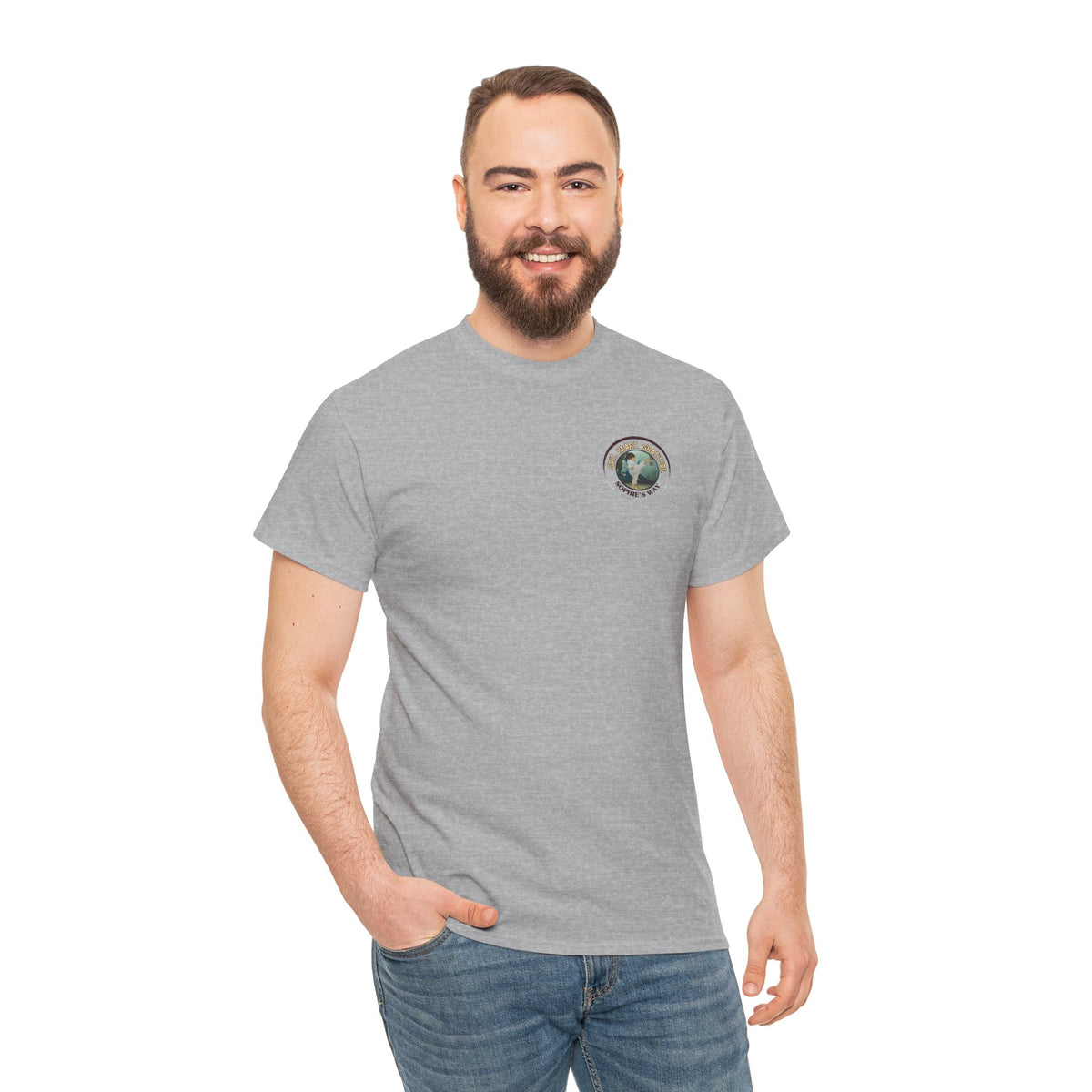 Sport grey colored t-shirt with a small round logo of a taekwondo girl doing a side kick and the words Grit. Heart. Gratitude. Sophie's Way.