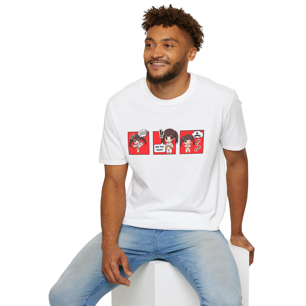 Are You Okay? unisex softstyle t-shirt in white with chibi taekwondo girl three-panel comic strip graphic — "Aiyah!", "Are You Okay?", "Hi Mommy"