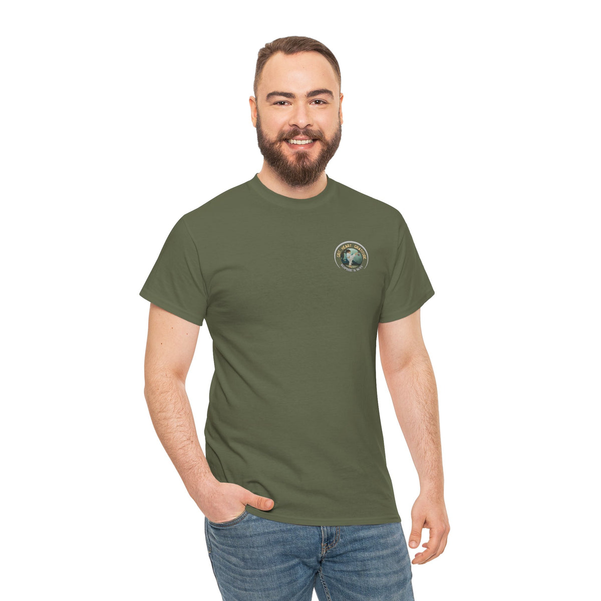 Military green colored t-shirt with a small round logo of a taekwondo girl doing a side kick and the words Grit. Heart. Gratitude. Sophie's Way.