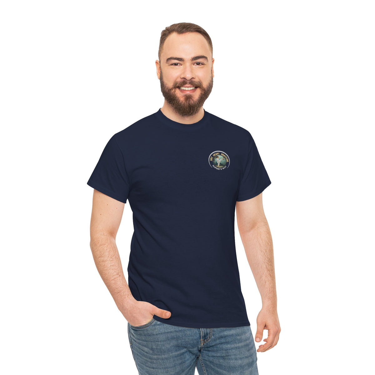 Navy t-shirt with a small round logo of a taekwondo girl doing a side kick and the words Grit. Heart. Gratitude. Sophie's Way.