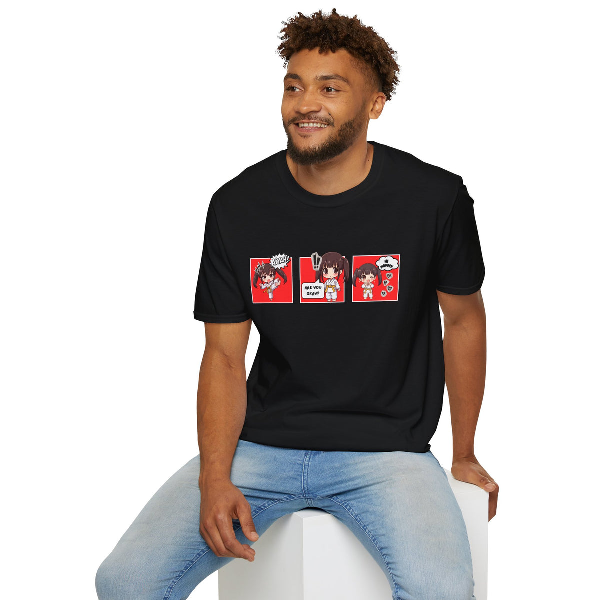 Are You Okay? unisex softstyle t-shirt in black with chibi taekwondo girl three-panel comic strip graphic — "Aiyah!", "Are You Okay?", "Hi Mommy"